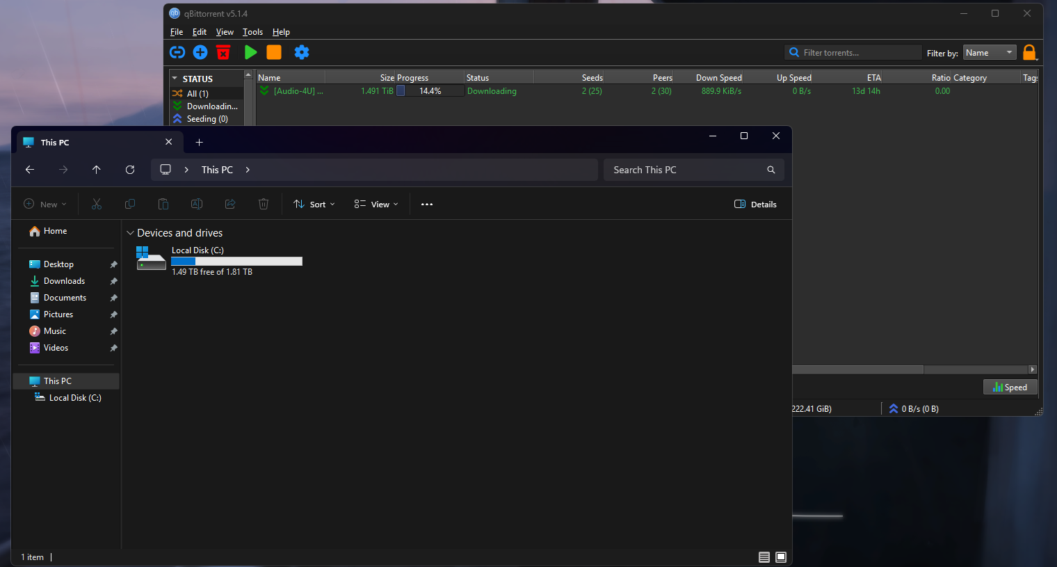 screenshot of my qbittorrent download of audio4u's j-core 14 collection (flac) and my explorer window showing a 2tb c drive
